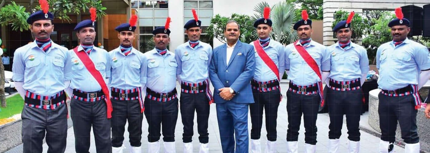 Om Sai Security Services team with management
